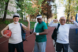 Senior men showing off their muscles.