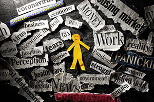 Little yellow paper person surrounded by fears and worries.
